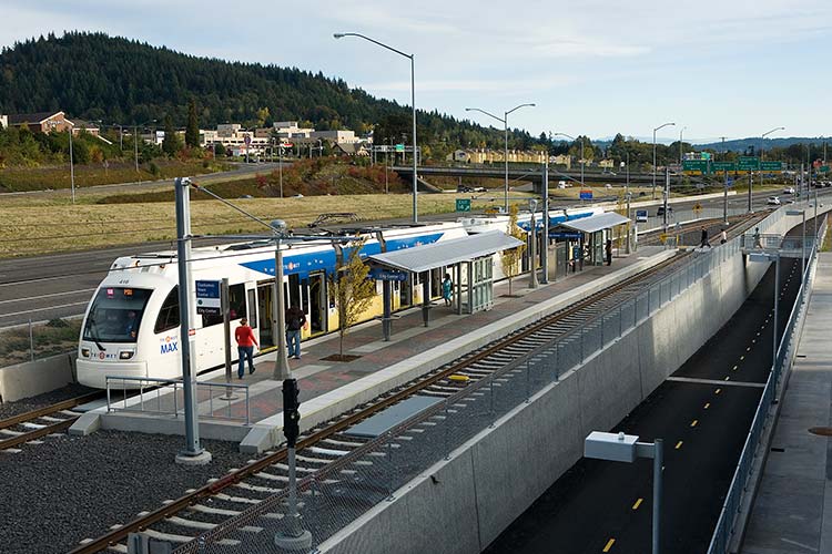 MAX Green Line at the Clackamas Town Center station. I-84 is to the left -- a bike greenway is to the right